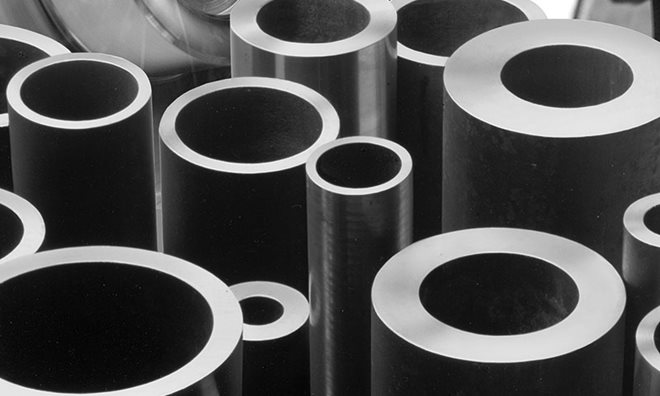 Seamless tubes and hollow bar